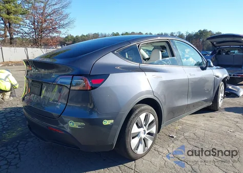 2023 Tesla Model Y Awd/Long Range Dual Motor All-Wheel Drive z USA, uszkodzony, nr VIN 7SAYGDEE9PF891902